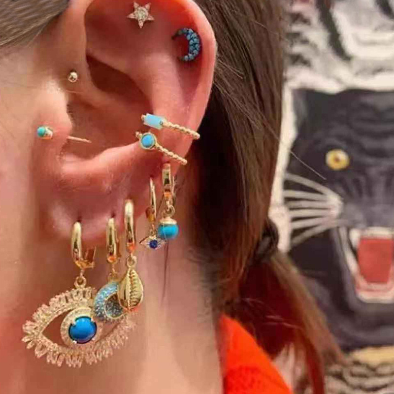 

Lovely Street Star Eyes Gold Earring