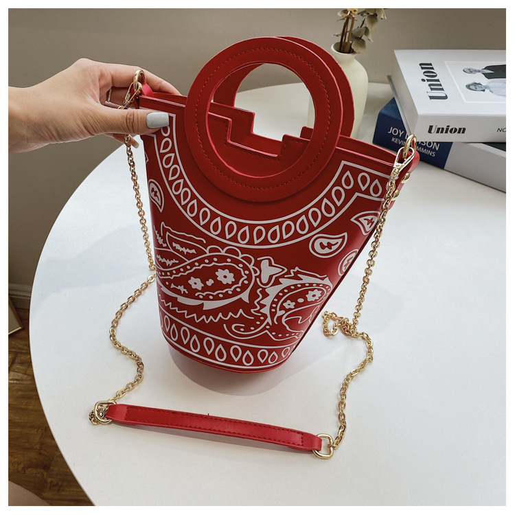 

LW Cashew Print Cylindrical Messenger Bag, Red
