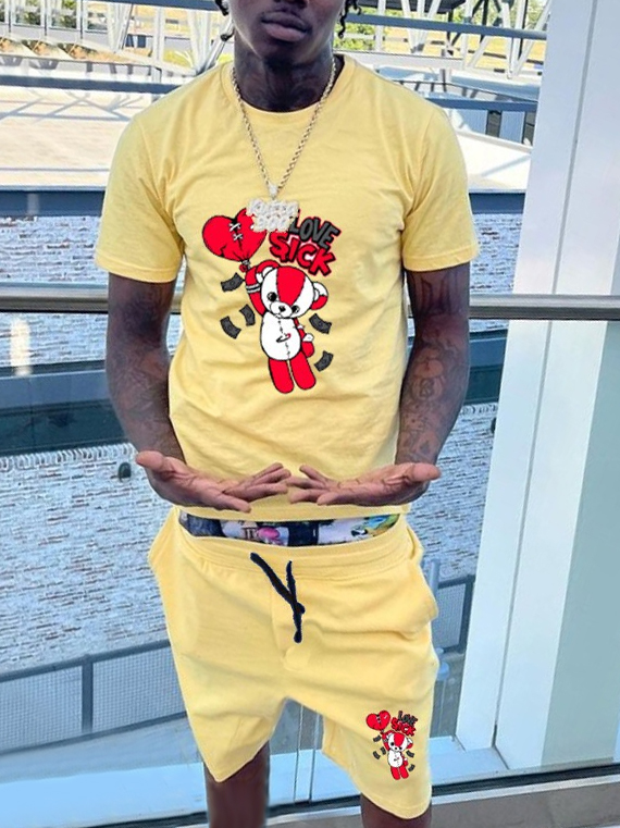 LovelyWholesale Men Cartoon Letter Print Drawstring Shorts Set Summer Short Sleeve Casual Pattern Round Neck Spring Summer 2024